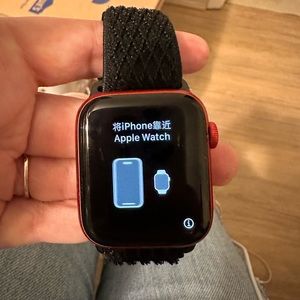 Apple Watch (Series 6) / 44mm Face / Red Aluminum / Black Textile Band